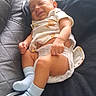 Emir joined the competition — help win amazing prizes! baby, infant, sleeping, smiling, child, portrait, car_interior, car_seat, onesie, diaper, socks, clothing, seated, relaxed, face, hands, legs, vehicle, indoor, photography