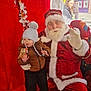 Luca is registered to the contest to win money with this photo: accessories, adult, baby, christmas, clothing, face, female, festival, glasses, glove, hat, head, hoodie, knitwear, male, man, person, santaclaus, sweater, woman