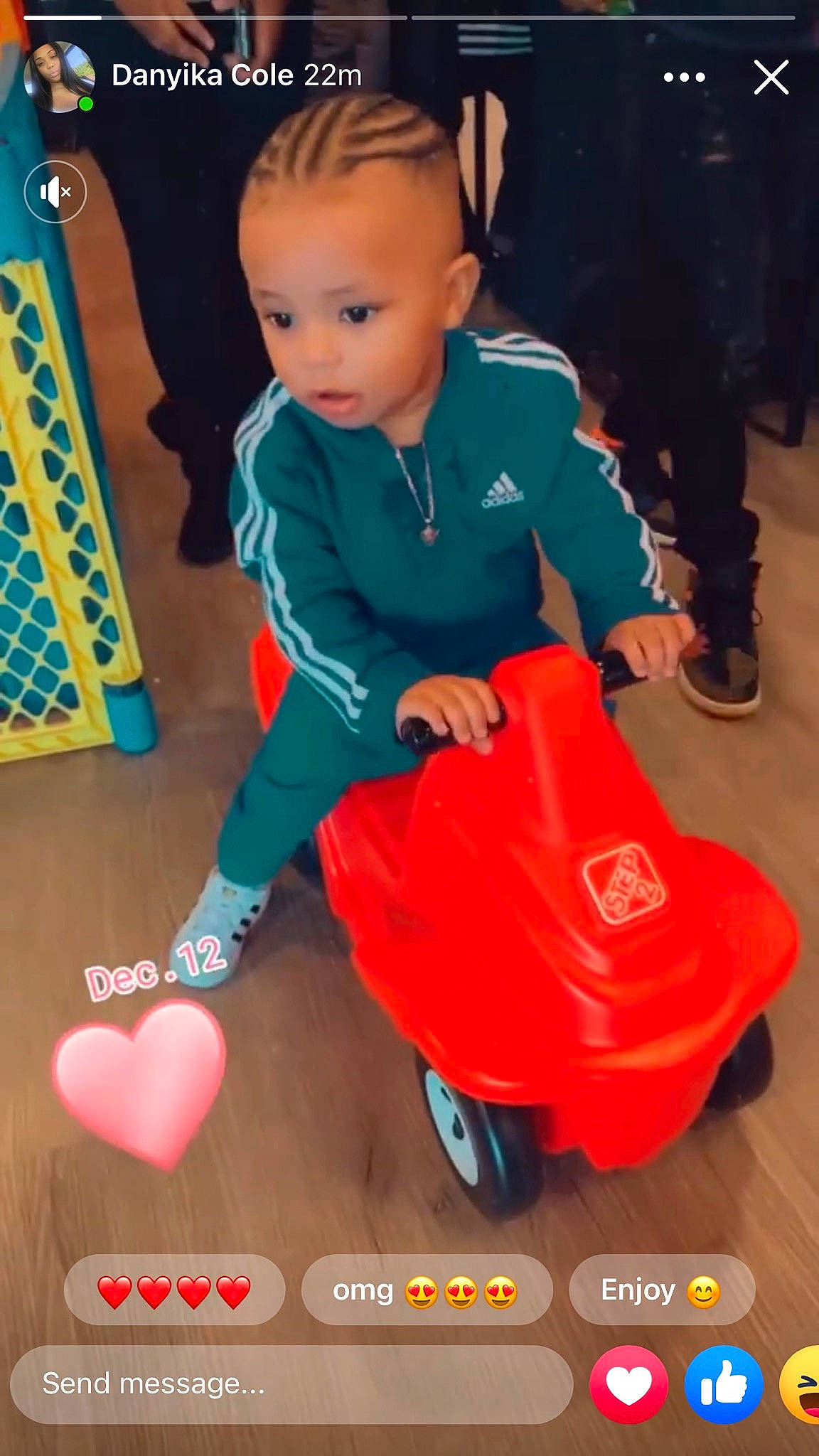 Kace joined the competition — help win amazing prizes! baby_products, baby_toddler_clothing, blue, child, electric_blue, flooring, fun, green, happy, motor_vehicle, orange, person, play, riding_toy, shoe, sitting, sneakers, tire, toddler, vehicle