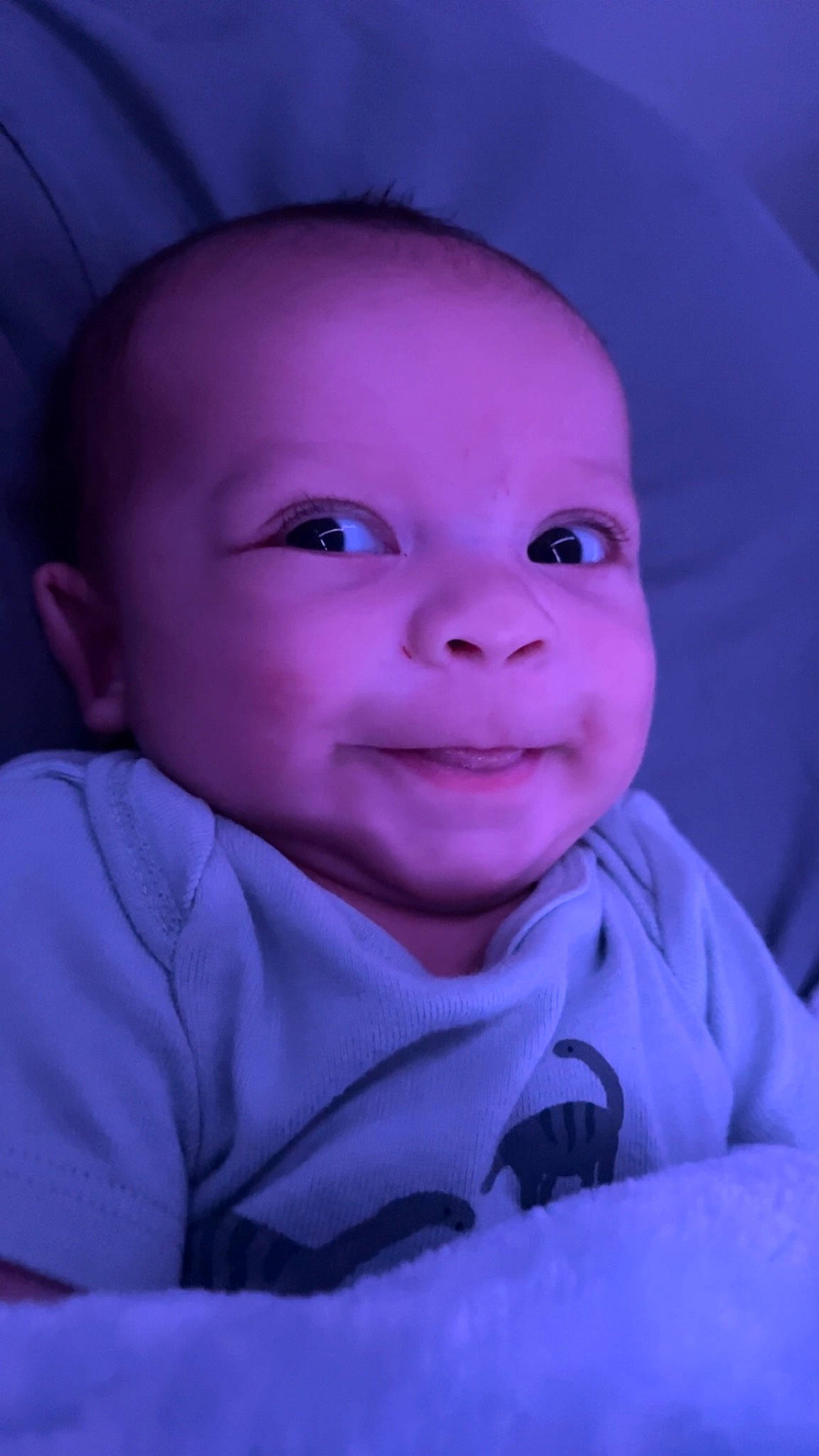 Zyaire is registered to the contest to win money with this photo: azure, baby, baby_toddler_clothing, cheek, comfort, electric_blue, eyebrow, flash_photography, happy, iris, lip, mouth, nose, person, pink, purple, skin, sleeve, smile, toddler