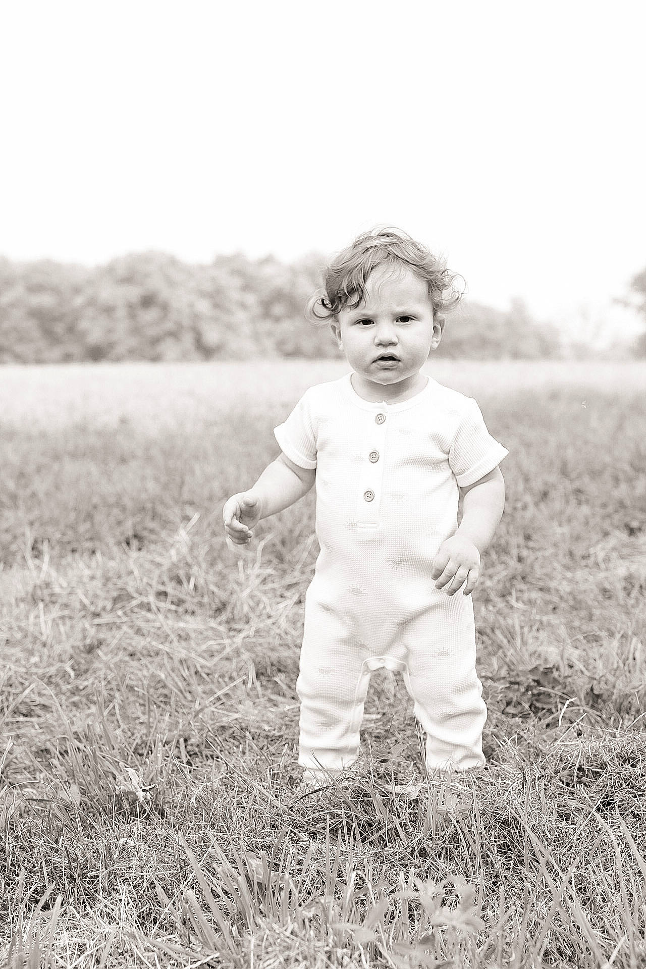 Kooper is registered to the contest to win money with this photo: art, baby, ball, child, flash_photography, fun, gesture, grass, grassland, hand, happy, landscape, meadow, monochrome, monochrome_photography, people_in_nature, person, playing_with_kids, prairie, sky