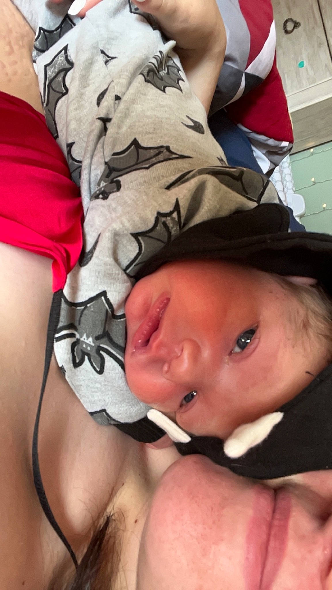 Paxton is registered to the contest to win money with this photo: abdomen, baby, baby_products, camouflage, cap, chest, child, eyelash, fashion_accessory, finger, fun, gesture, hat, military_camouflage, nail, pattern, person, selfie, sun_hat, thigh