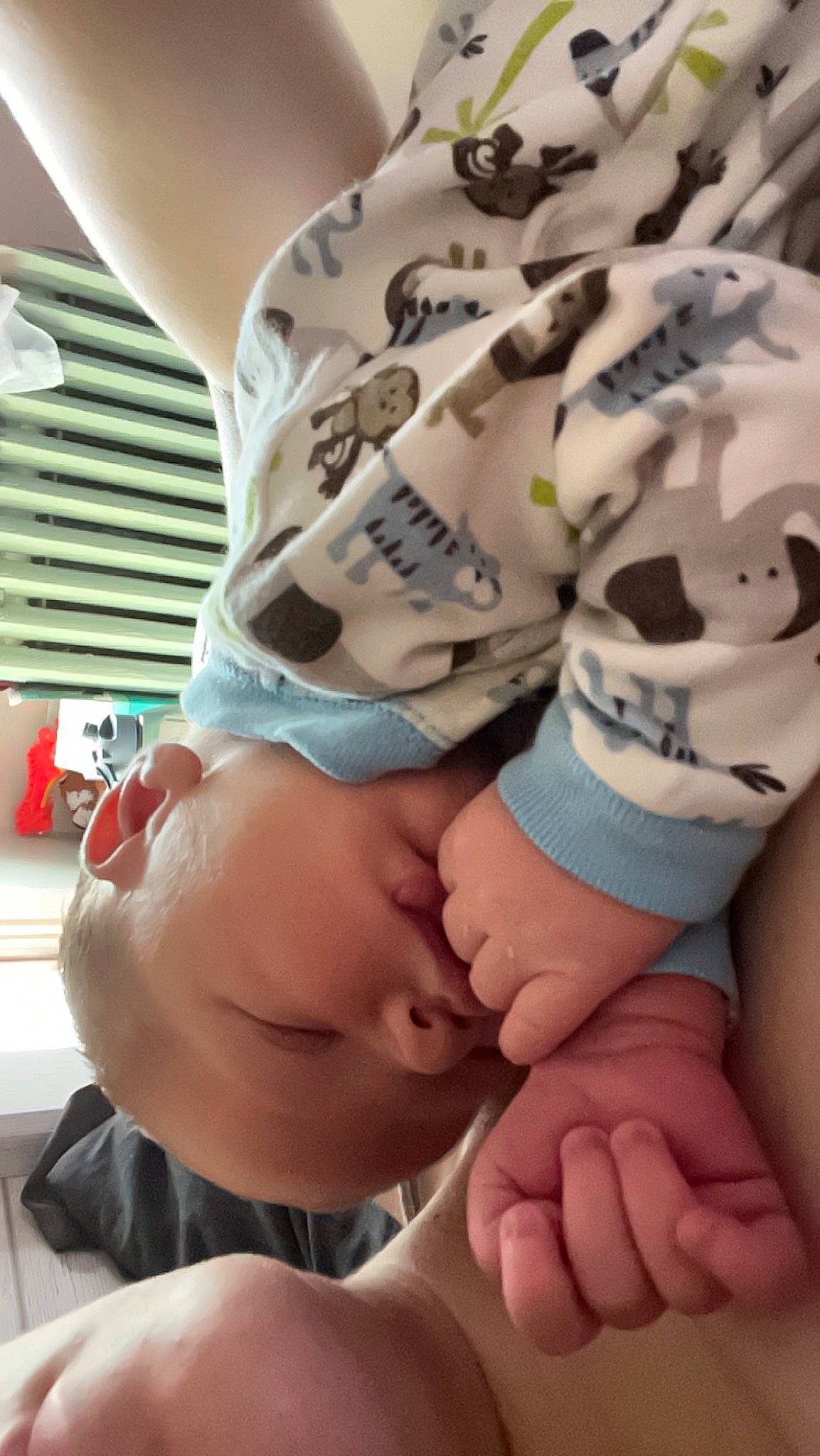 Paxton is registered to the contest to win money with this photo: abdomen, baby, chest, child, comfort, elbow, finger, flesh, fun, gesture, hand, happy, human_leg, knee, linens, nail, pattern, person, thigh, thumb