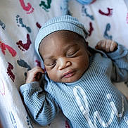 Makaio joined the competition — help win amazing prizes! newborn, baby, sleeping, infant, blue_outfit, hat, blanket, footprints, cozy, peaceful, portrait, cute, resting, child, indoor, soft_light, closeup, tiny_hands, sleep, face