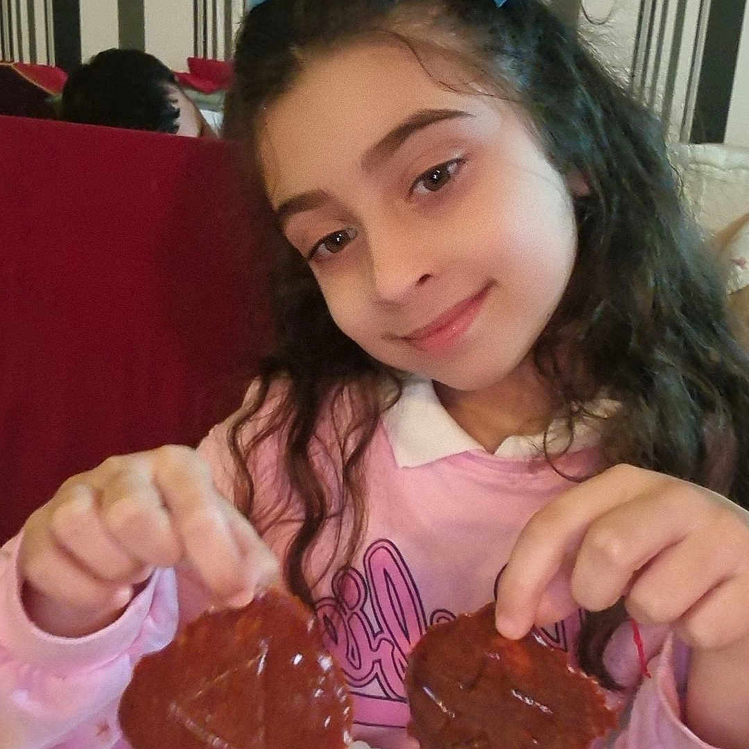 Antonia Nicole Sandu is registered to the contest to win money with this photo: bodypart, cake, child, chocolate, cream, cupcake, dessert, dish, face, female, finger, food, girl, head, icing, meal, person, photography, portrait, sweets