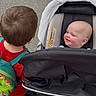 Meredith joined the competition — help win amazing prizes! baby, toddler, stroller, backpack, child, smile, outdoor, pavement, person, head, hair, clothing, seat, baby_stroller, happy, infant, cute, walking, daylight, parenting