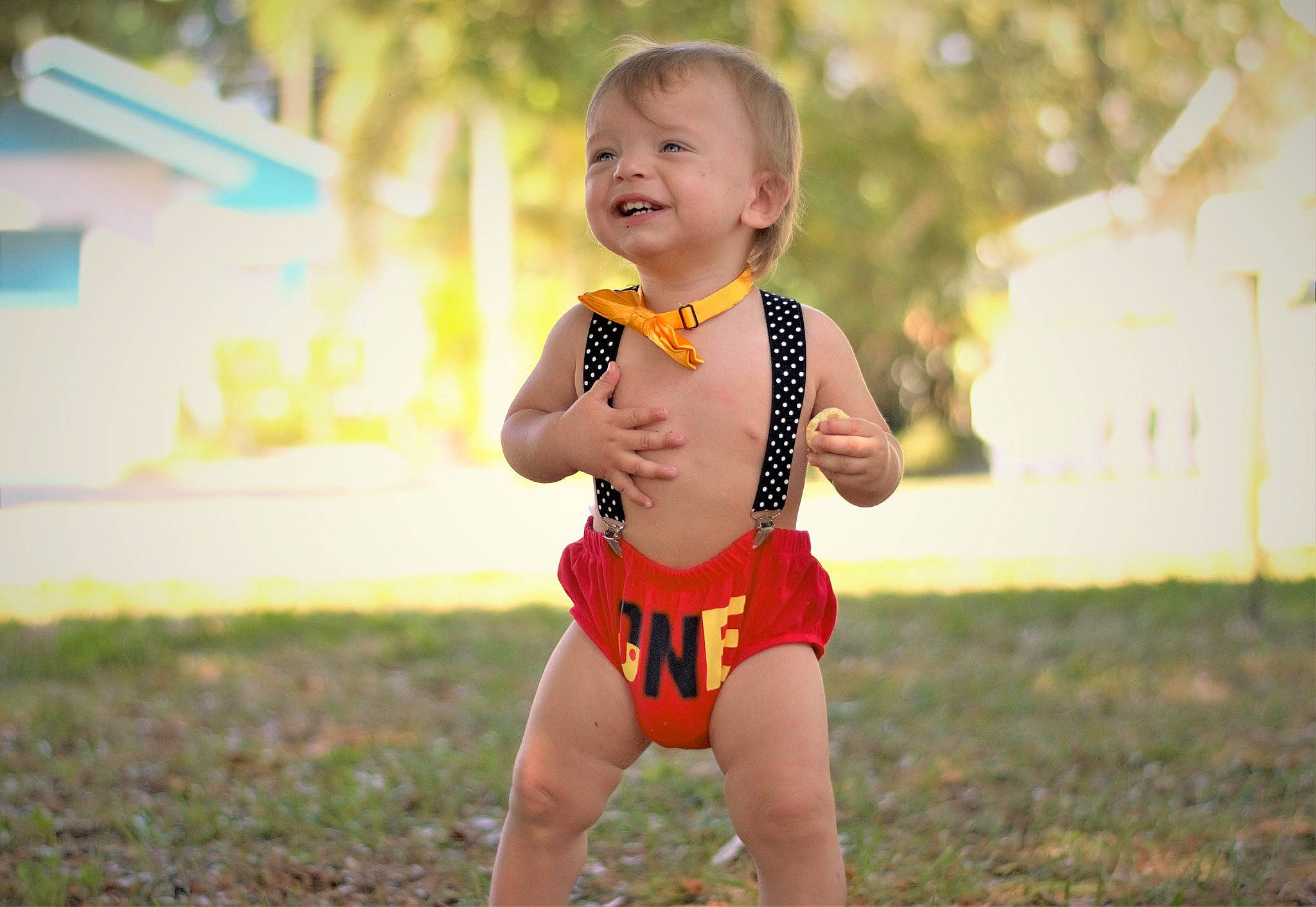 Jacob is registered to the contest to win money with this photo: baby, baby_toddler_clothing, child, child_model, fun, grass, happy, joy, person, photograph, photography, play, skin, summer, swimwear, toddler, vacation, yellow