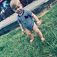Kayson joined the competition — help win amazing prizes! toddler, child, grass, barefoot, onesie, striped_clothing, outdoor, playground, smile, baby, person, curious, young_child, head, face, short_hair, daylight, nature, fun, candid