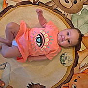 Aleyna a rejoint le concours — aidez-le/la à gagner de superbes lots ! baby, infant, orange_clothing, smiling, animal_rug, milestone_marker, foot, toenail_paint, diaper, cute, lying_down, child, indoor, play_mat, colorful, decorative_rug, person, young_baby, three_months, happy