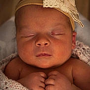 Isabella is registered to the contest to win money with this photo: newborn, baby, sleeping, blanket, headband, lace, hands, closeup, infant, peaceful, soft, cute, portrait, skin, fingers, nap, cozy, child, rest, adorable