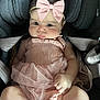 baby, infant, child, pink_bow, pink_dress, car_seat, cute, chubby_cheeks, headband, clothing, sitting, portrait, adorable, young_child, indoors, person, baby_girl, seatbelt, fabric, cute_face
