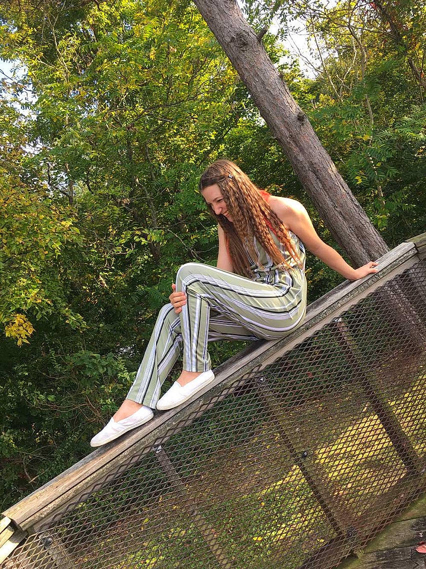 Terri is registered to the contest to win money with this photo: beauty, botany, branch, dress, fashion, joy, leisure, long_hair, person, photo_shoot, photography, plant, sitting, sunlight, tree, woody_plant