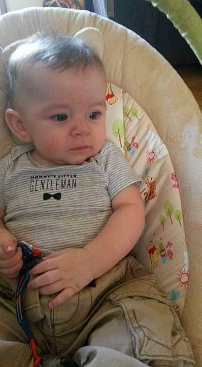 Jacob Huff is registered to the contest to win money with this photo: baby, baby_products, baby_toddler_clothing, chair, cheek, child, comfort, couch, facial_expression, finger, hair, hairstyle, head, lap, nose, person, sitting, skin, sleeve, smile