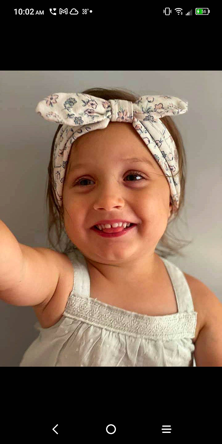 Cora joined the competition — help win amazing prizes! bridal_accessory, bridal_clothing, clothing, dress, embellishment, eye, eyebrow, eyelash, flash_photography, gesture, happy, headband, headgear, headpiece, headwear, iris, jewellery, joy, person, pink