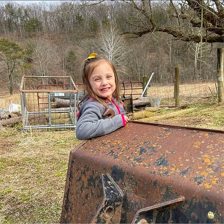 Cora joined the competition — help win amazing prizes! fun, grass, grassland, happy, jacket, joy, landscape, leisure, pattern, people_in_nature, person, plant, prairie, recreation, sleeve, smile, soil, spring, tree, winter
