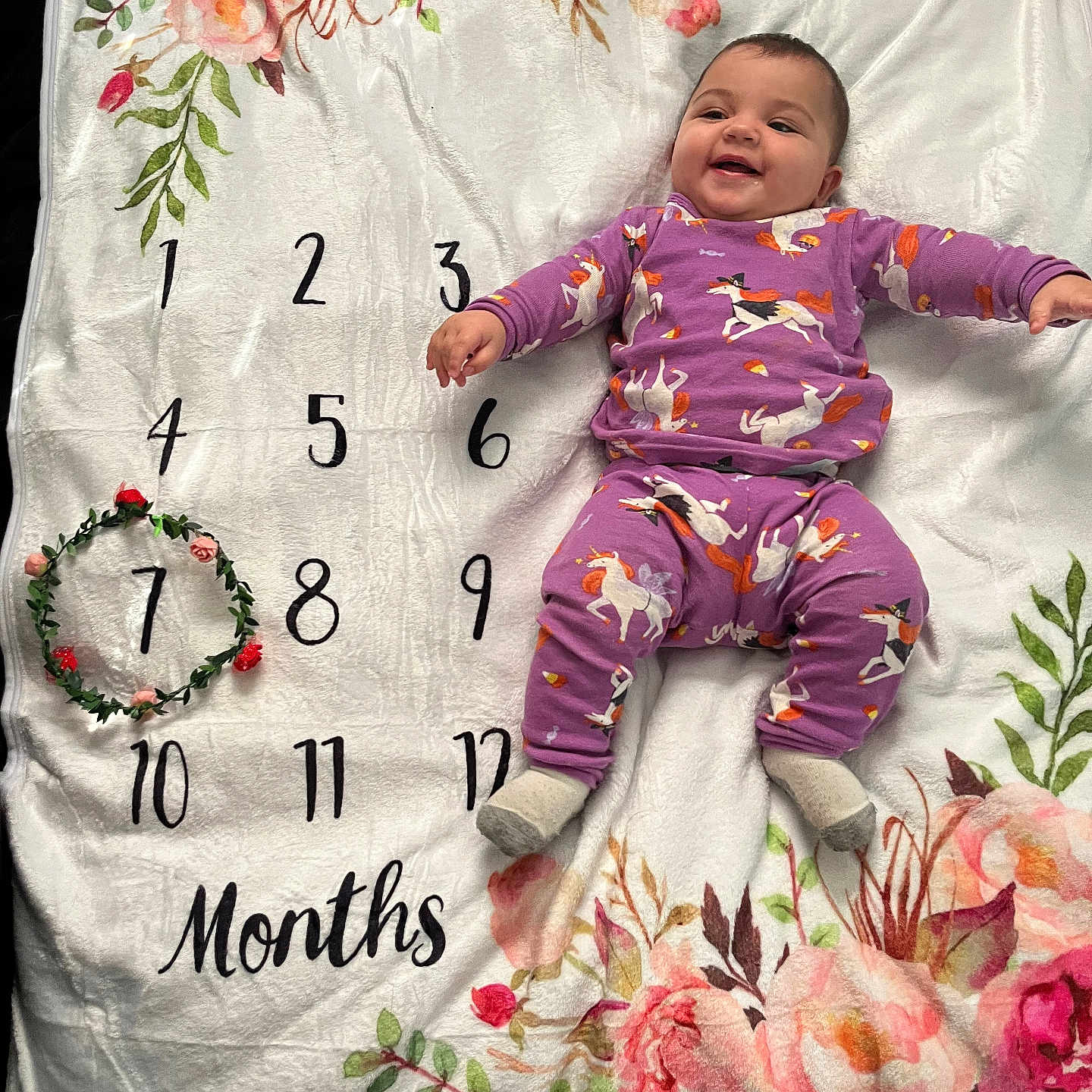 Ari joined the competition — help win amazing prizes! baby, bed, blanket, clothing, cushion, dress, face, furniture, head, homedecor, hosiery, newborn, pattern, person, photography, pillow, portrait, quilt, sock, text