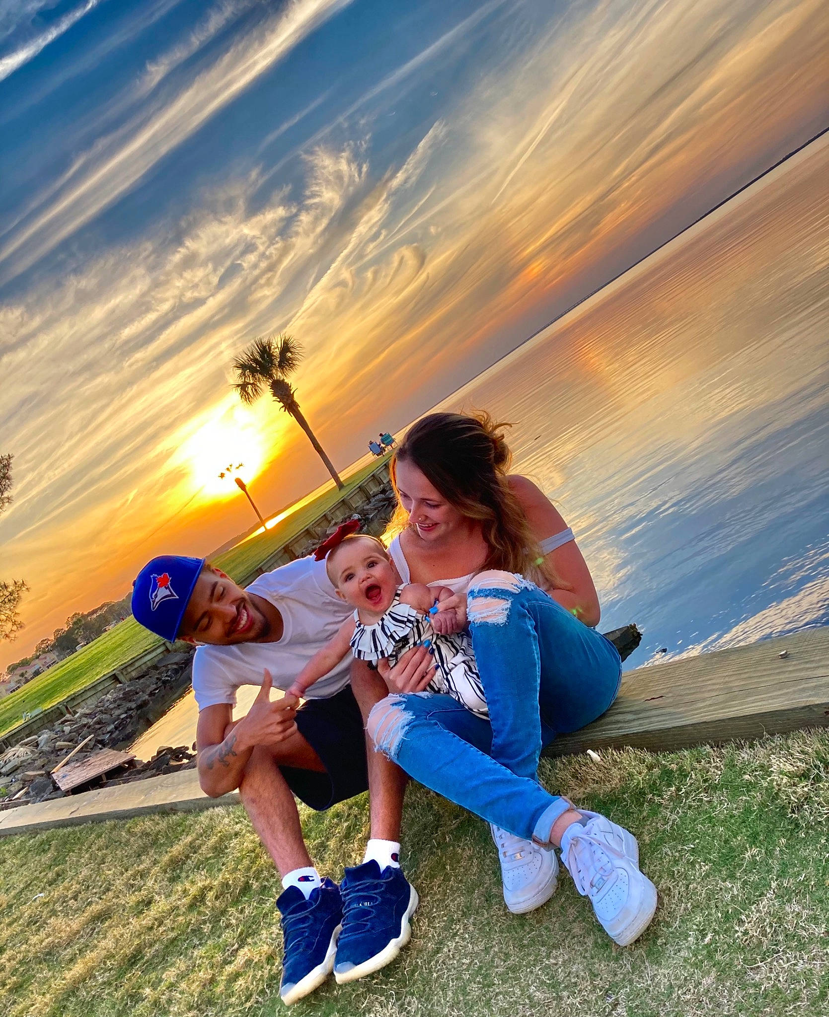 Jodeci is registered to the contest to win money with this photo: azure, balloon, cloud, flash_photography, footwear, friendship, grass, grassland, happy, headwear, horizon, joy, leisure, people_in_nature, person, plant, shoe, shorts, sky, sneakers