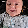 Arthur participe au concours pour gagner de l'argent avec cette photo : baby, smiling, blanket, clothing, face, infant, happy, portrait, cute, child, sleepwear, patterned, cozy, wrapped, closeup, skin, head, expression, indoors, young