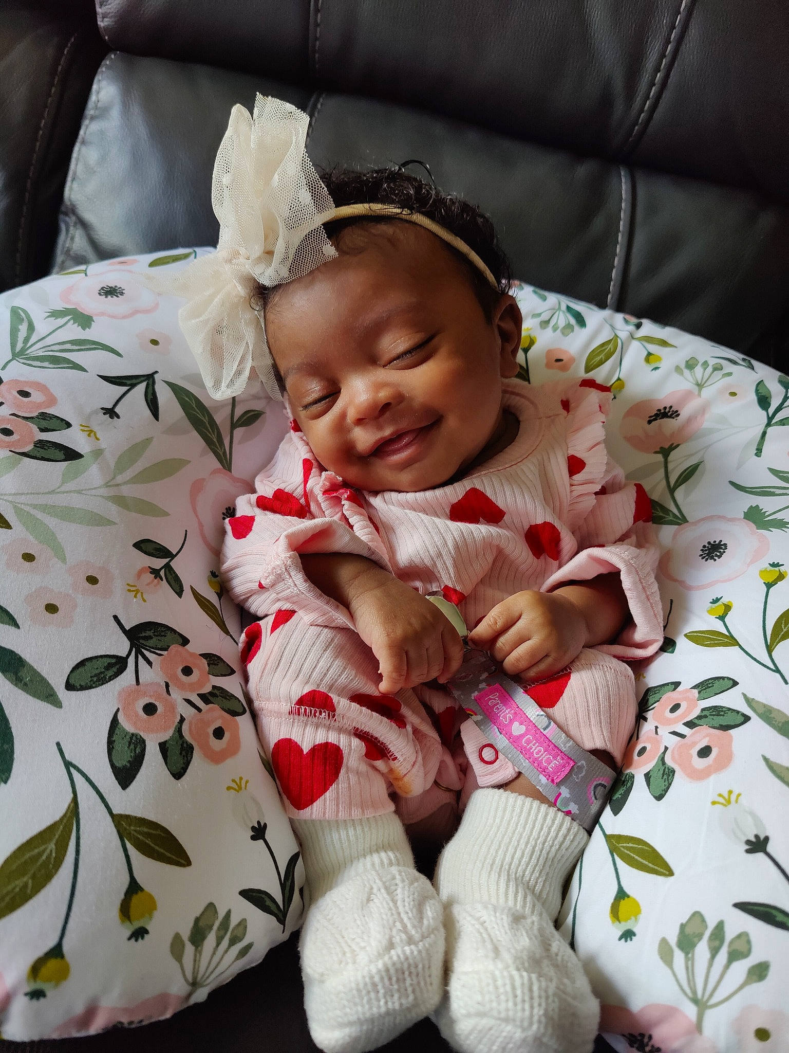 Charleigh joined the competition — help win amazing prizes! baby, baby_toddler_clothing, bedding, carmine, child, comfort, dress, foot, happy, human_leg, linens, pattern, person, sitting, skin, sleeve, smile, sock, thigh, toddler