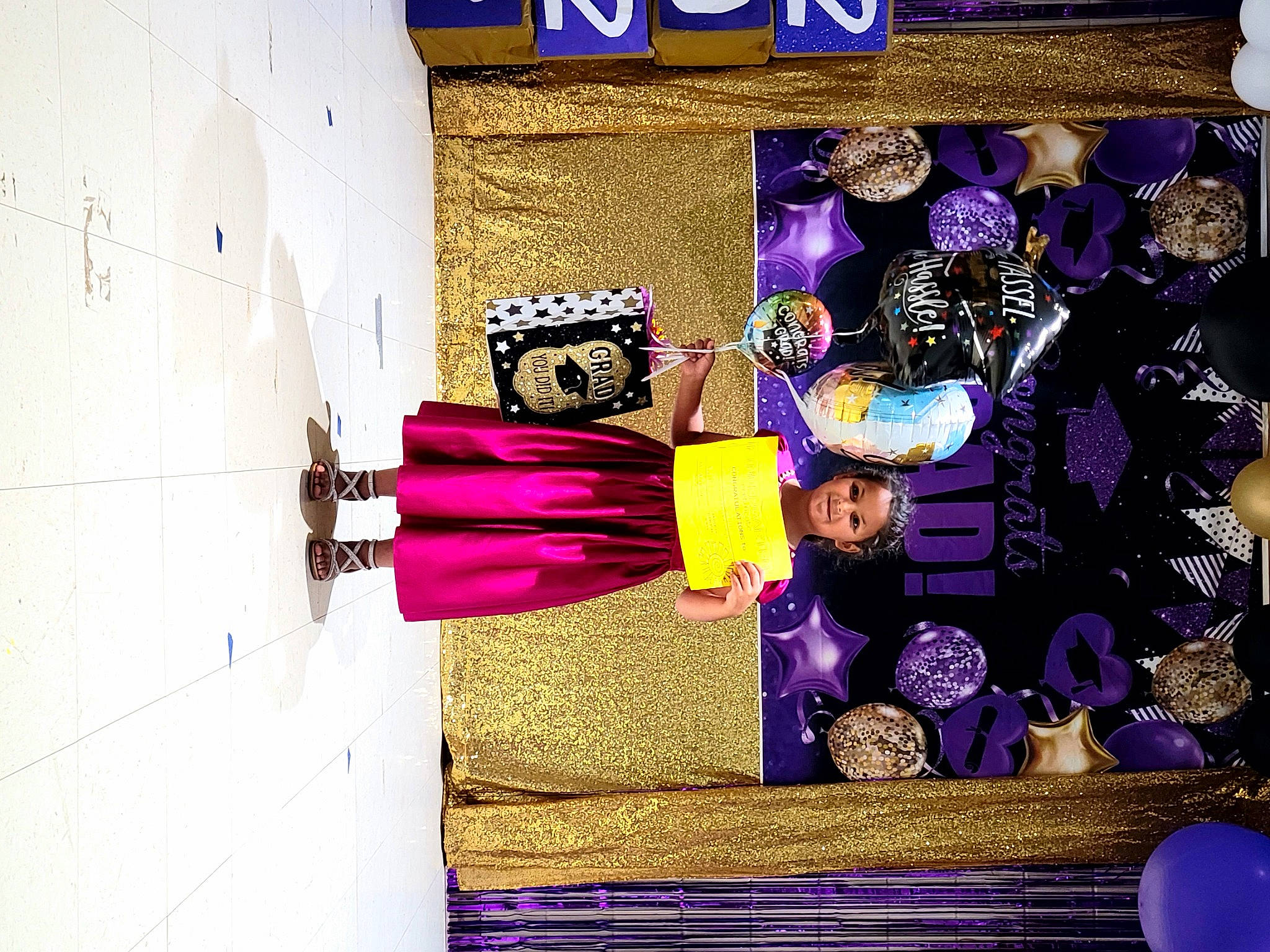 Madison joined the competition — help win amazing prizes! art, building, display_case, electric_blue, event, fashion_accessory, fashion_design, font, headwear, joy, magenta, pattern, person, pink, purple, rectangle, retail, room, textile, tints_and_shades