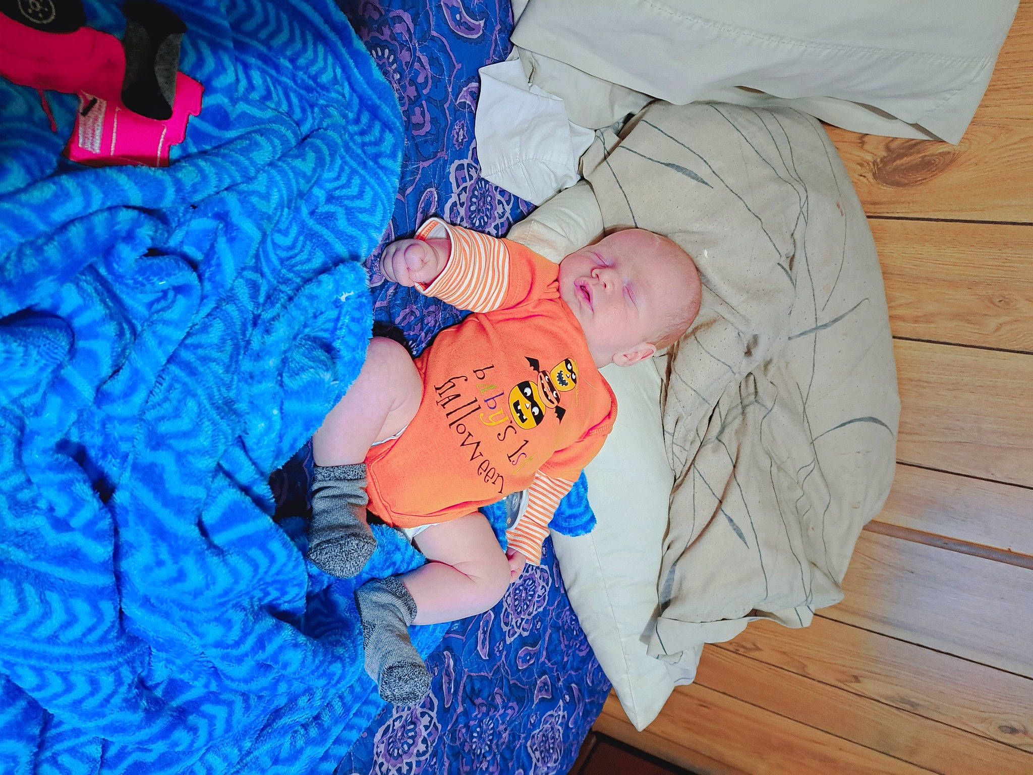 Weston is registered to the contest to win money with this photo: baby, baby_products, baby_toddler_clothing, blue, child, comfort, electric_blue, fun, happy, hardwood, lap, linens, pattern, person, room, sitting, smile, t_shirt, toddler, vacation