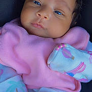 Jahlani is registered to the contest to win money with this photo: baby, infant, child, pink_bib, pink_bow, blue_eyes, cute, soft_lighting, cozy_clothing, portrait, closeup, newborn, sleepwear, patterned_clothing, baby_girl, face, skin, expression, indoors, blanket