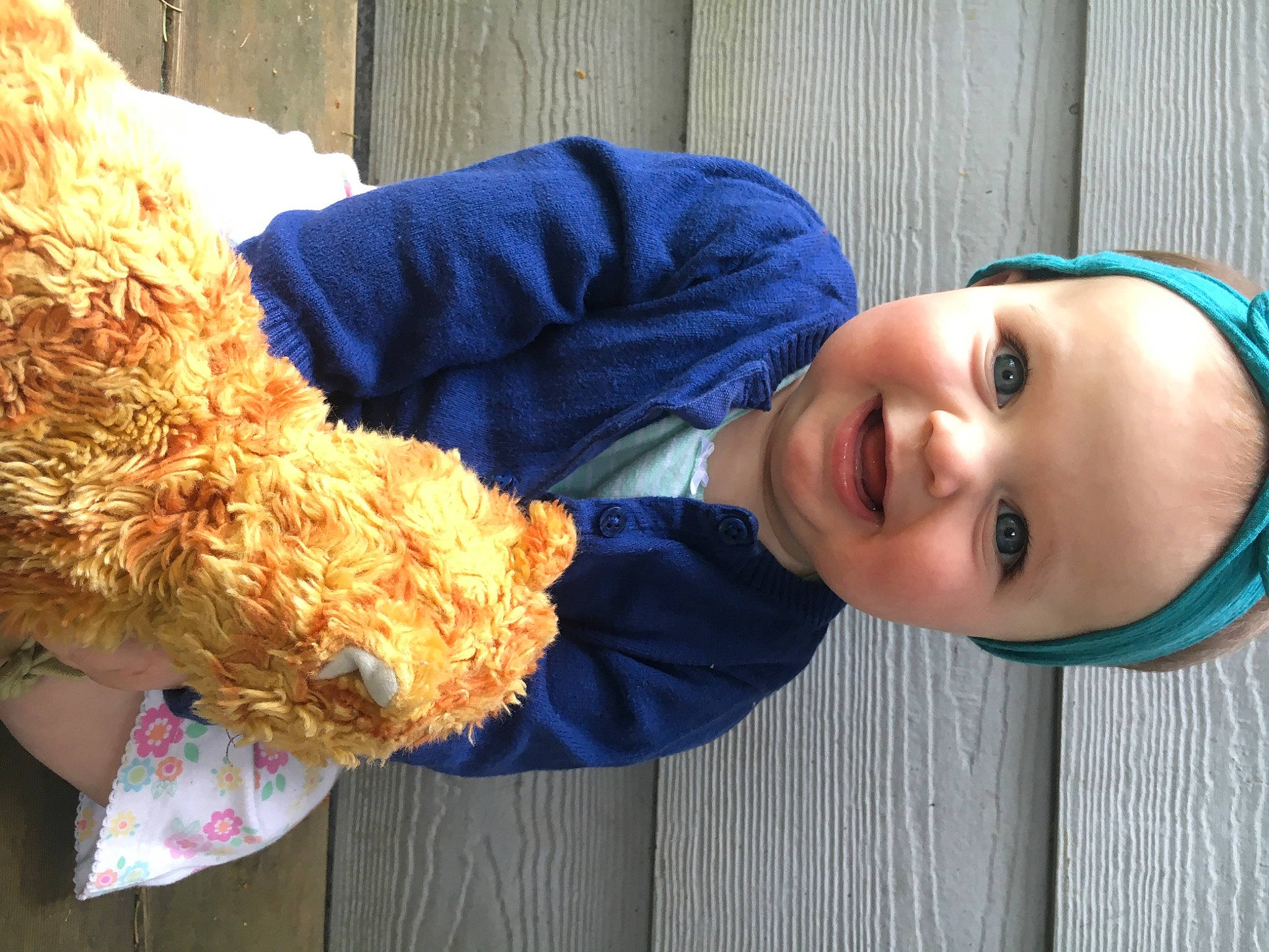 Eden is registered to the contest to win money with this photo: child, companion_dog, electric_blue, eye, face, fun, fur, grass, happy, joy, person, plant, portrait_photography, smile, sporting_group, stuffed_toy, teddy_bear, toddler, tree, wool