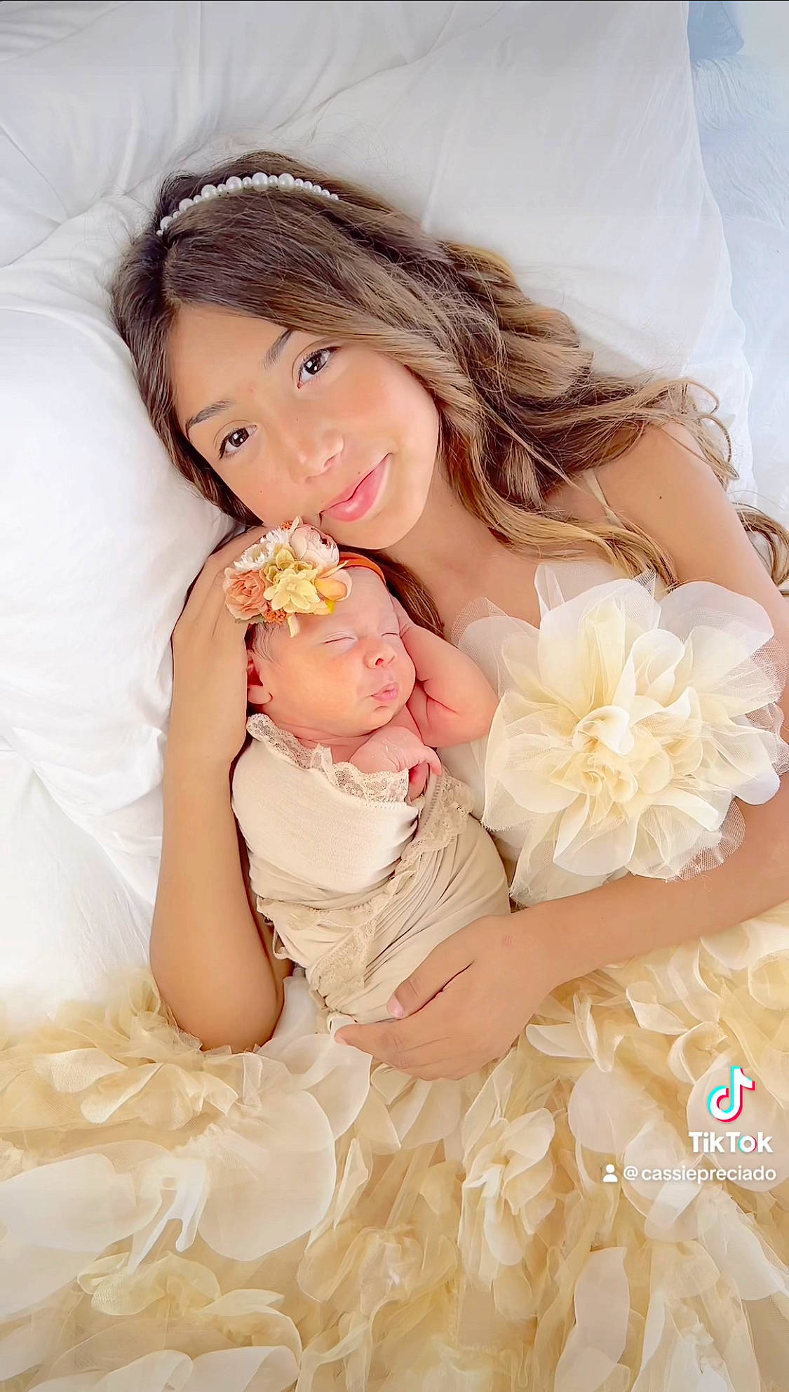 Juliette joined the competition — help win amazing prizes! baby, bridal_accessory, bridal_clothing, dress, event, face, finger, flash_photography, flower, gesture, gown, hand, happy, headpiece, joy, person, petal, pink, rose, textile