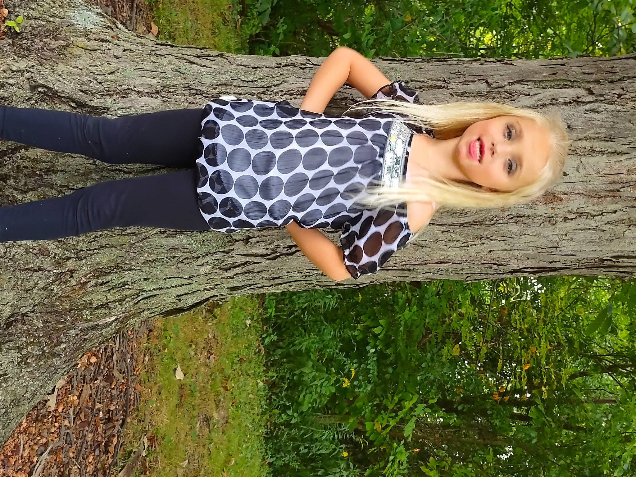 Lailani joined the competition — help win amazing prizes! blond, fun, grass, grass_family, grassland, green, happy, human_leg, knee, landscape, leisure, pattern, people_in_nature, person, plant, thigh, tree, trunk, waist, wood