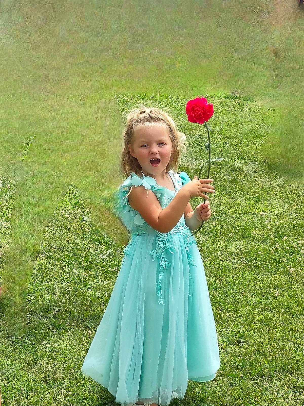 Mia joined the competition — help win amazing prizes! botany, clothing, day_dress, dress, facial_expression, flower, gesture, grass, grassland, hand, happy, leaf, one_piece_garment, people_in_nature, person, petal, pink, plant, smile, sunlight