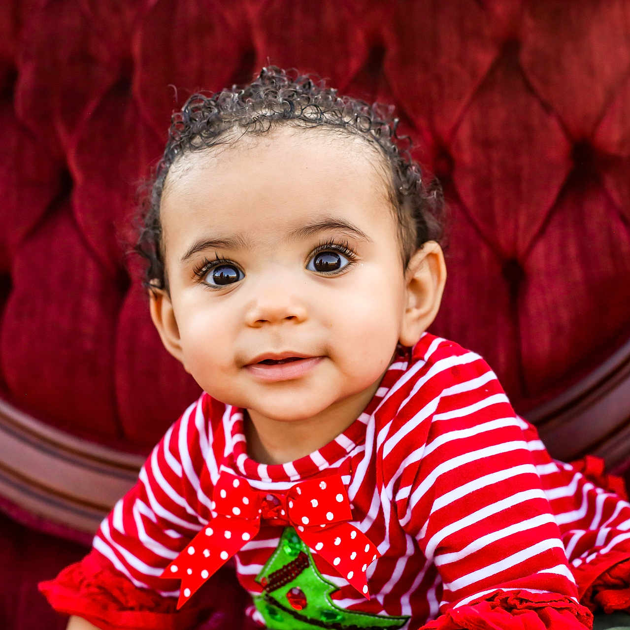 Magnolia is registered to the contest to win money with this photo: baby, bodypart, chair, clothing, couch, crawling, dress, face, finger, furniture, hand, happy, head, pattern, person, photography, polkadot, portrait, sitting, smile