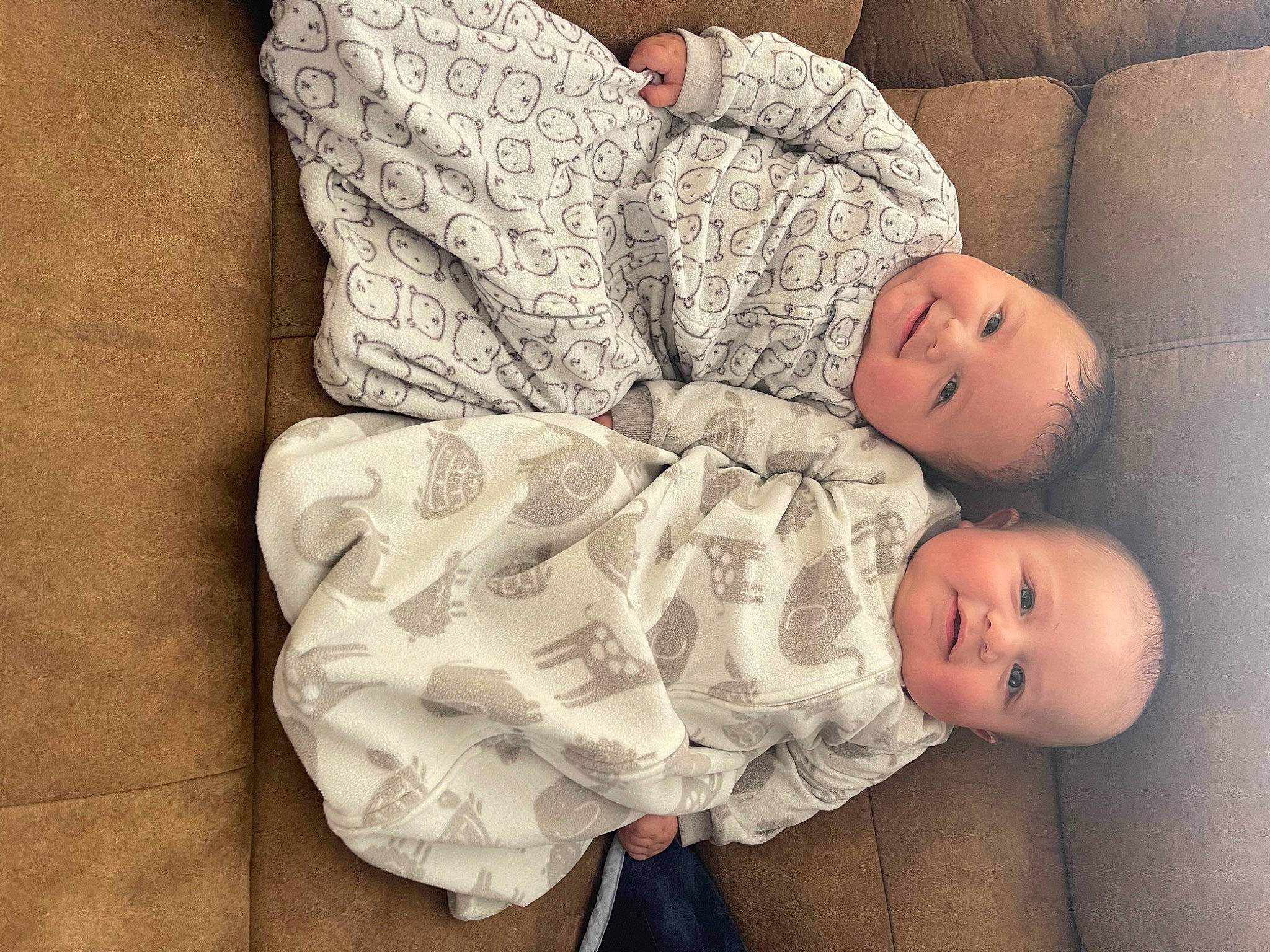 Jaxon is registered to the contest to win money with this photo: baby, baby_sleeping, baby_toddler_clothing, cheek, child, comfort, couch, eye, face, finger, flooring, hand, head, joy, linens, person, sitting, skin, sleeve, textile