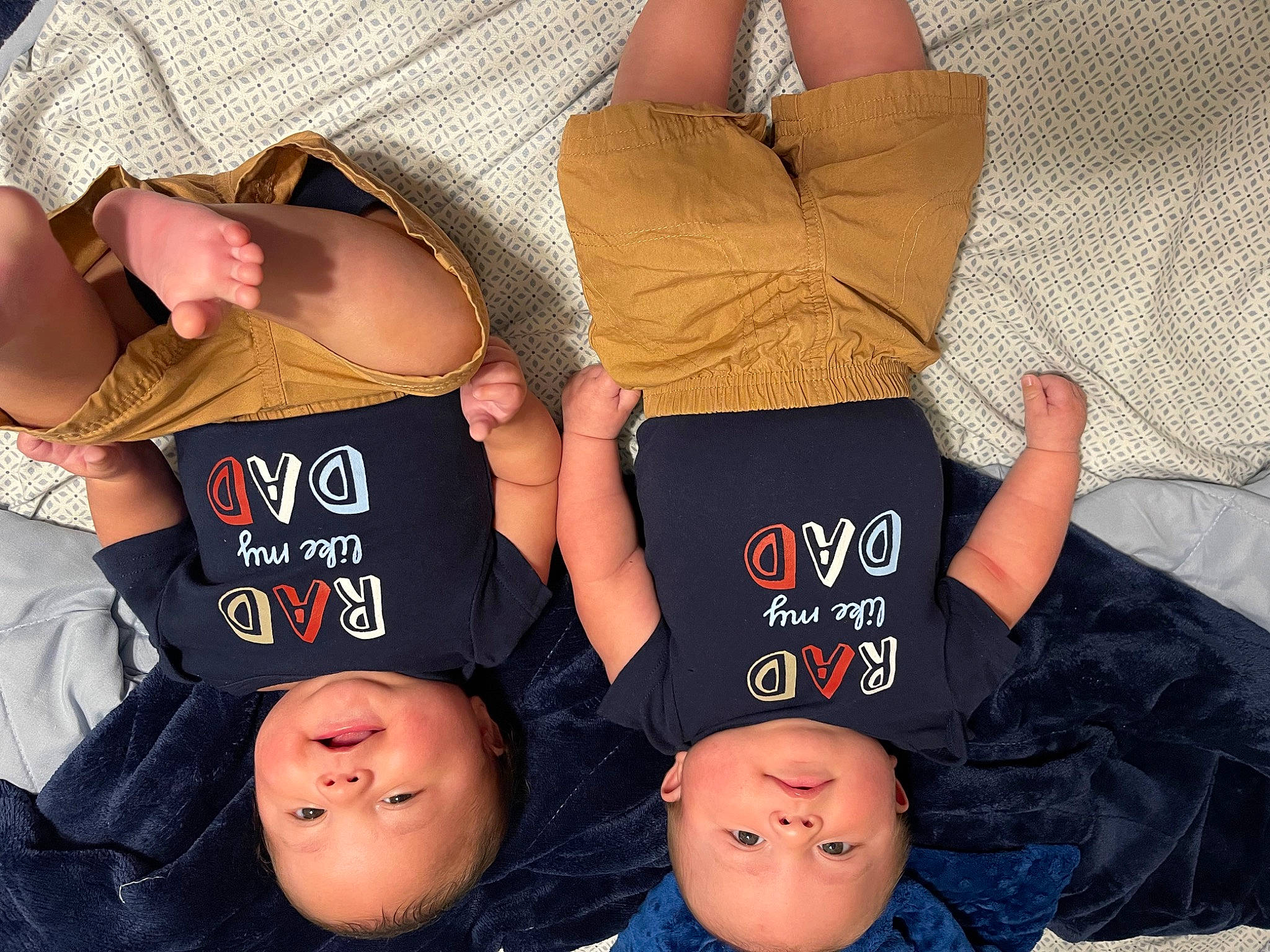 Jaxon is registered to the contest to win money with this photo: black, comfort, cool, elbow, finger, gesture, headgear, human, human_leg, joint, knee, mouth, person, product, sitting, sleeve, t_shirt, thigh, trunk, wrist