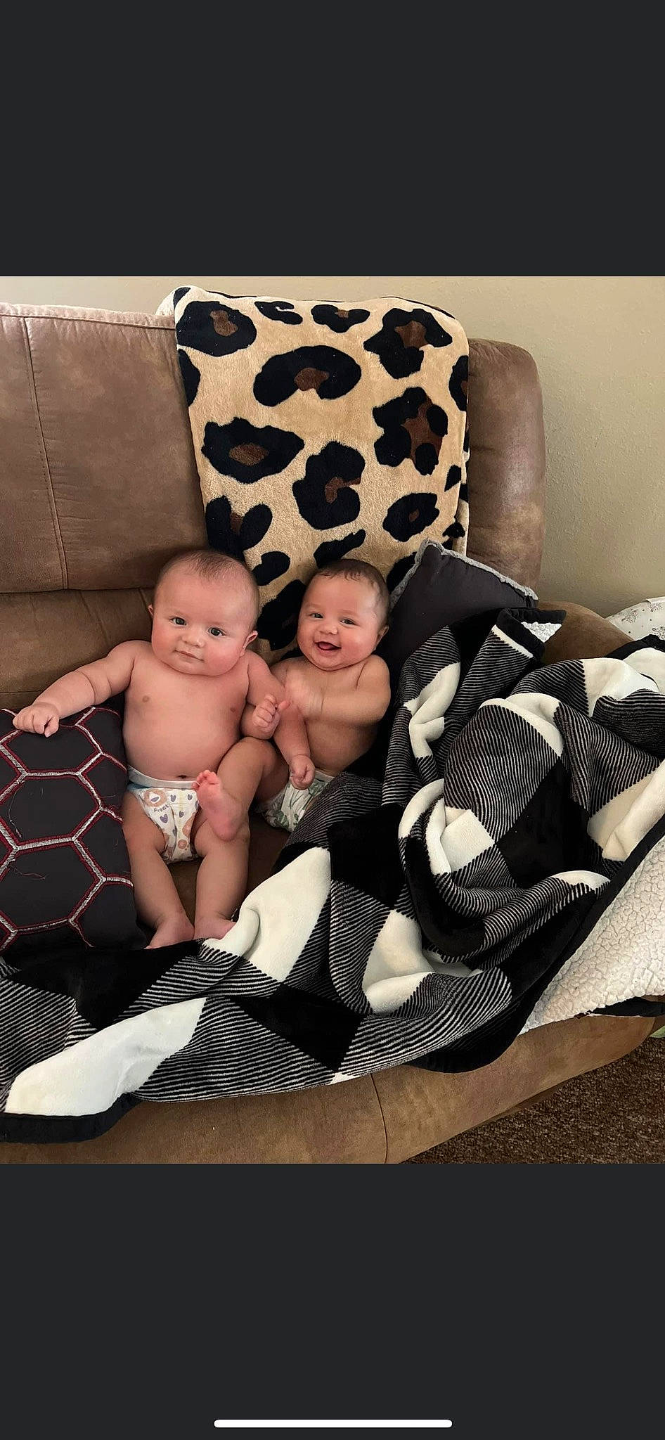 Judson is registered to the contest to win money with this photo: baby, baby_toddler_clothing, child, comfort, couch, flash_photography, foot, joy, linens, monochrome, monochrome_photography, pattern, person, product, room, shoe, shorts, sitting, sock, style