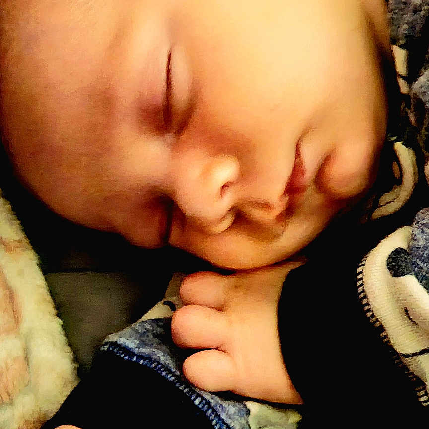 Braylee joined the competition — help win amazing prizes! baby, baseball, baseballglove, blanket, bodypart, clothing, crib, face, finger, furniture, glove, hand, head, infantbed, newborn, person, photography, portrait, quilt, sleeping
