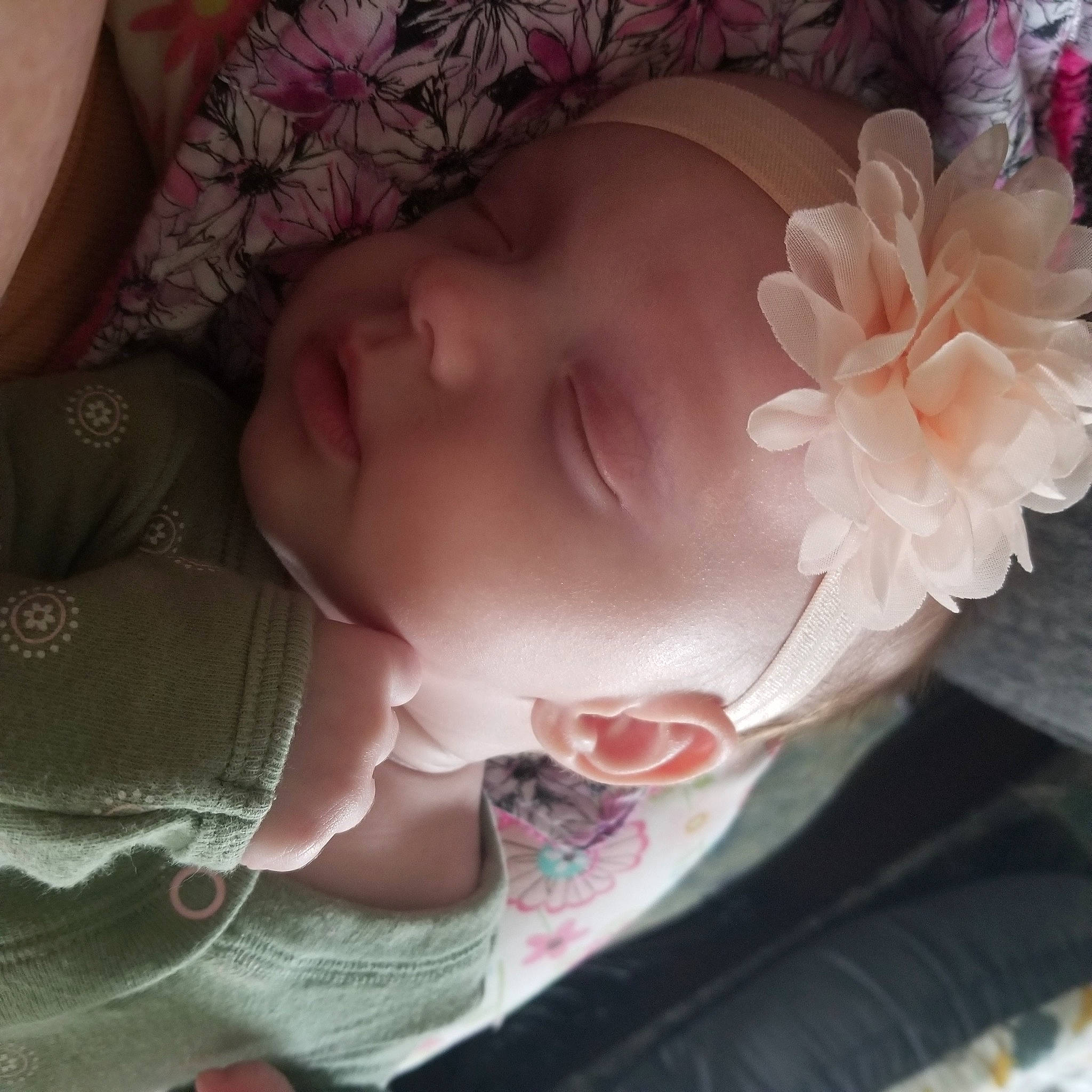 Fianna is registered to the contest to win money with this photo: arm, baby_toddler_clothing, cheek, chin, ear, eye, eyebrow, eyelash, forehead, hair, hand, head, headwear, human_body, lip, mouth, neck, nose, person, skin