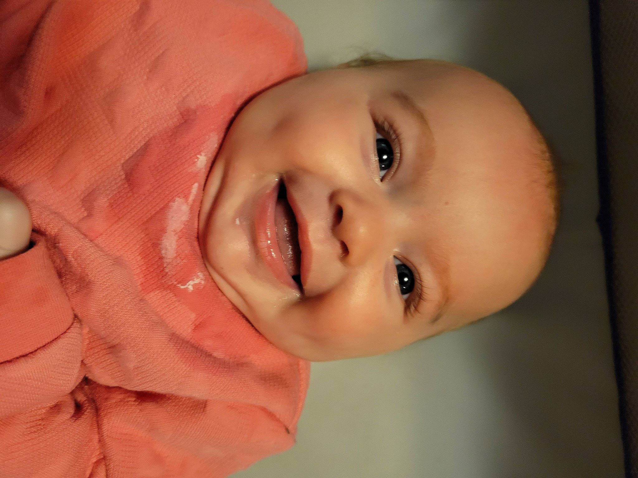 Alexandra is registered to the contest to win money with this photo: baby, cheek, close_up, ear, eyelash, finger, flash_photography, forehead, gesture, hair, happy, human_body, iris, joy, lip, mouth, neck, nose, person, skin