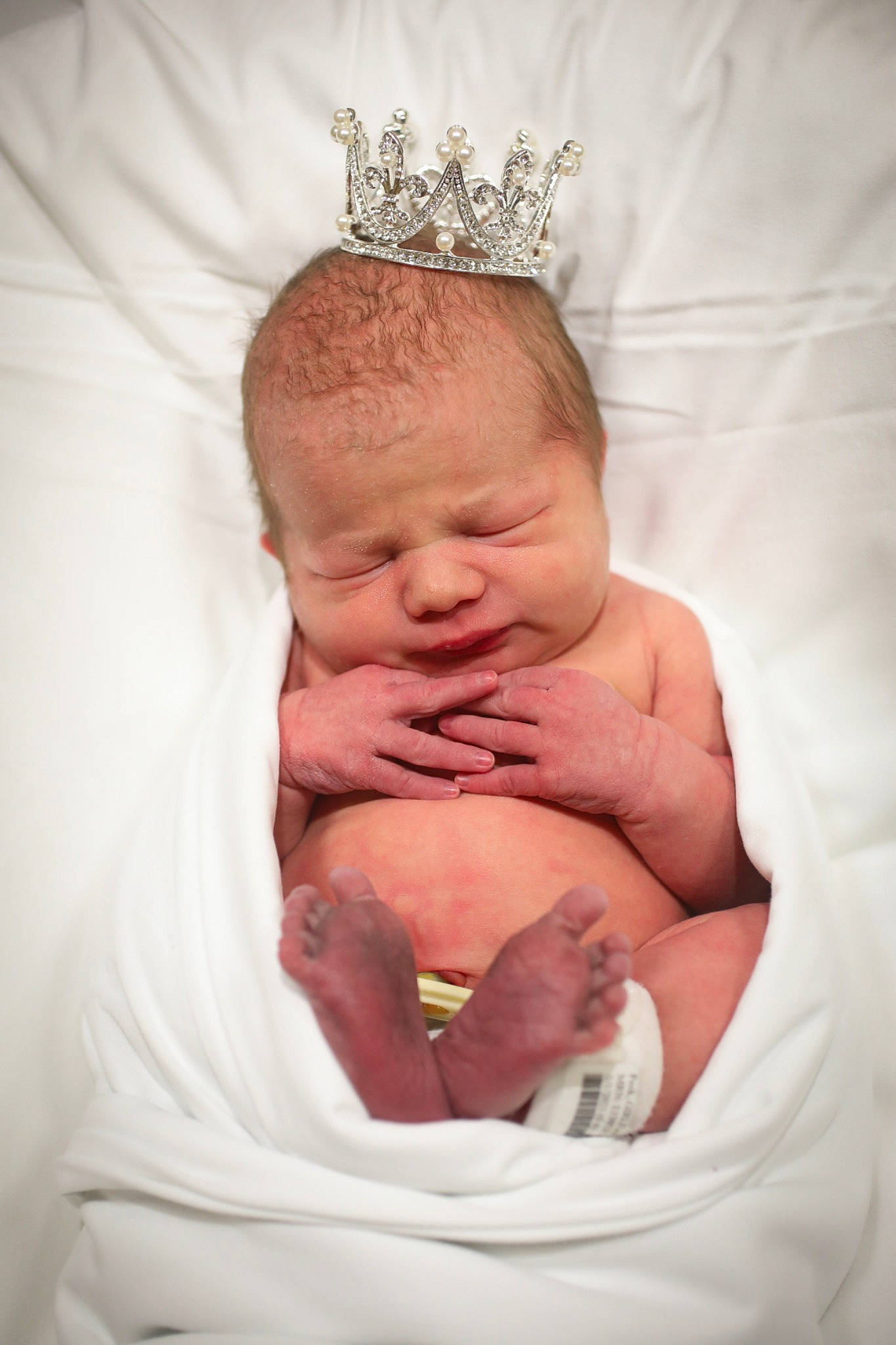 Leighton joined the competition — help win amazing prizes! abdomen, arm, baby, comfort, crown, eye, eyelash, face, gesture, hand, headband, headpiece, human_body, jewellery, nail, neck, person, stomach, thumb, tiara