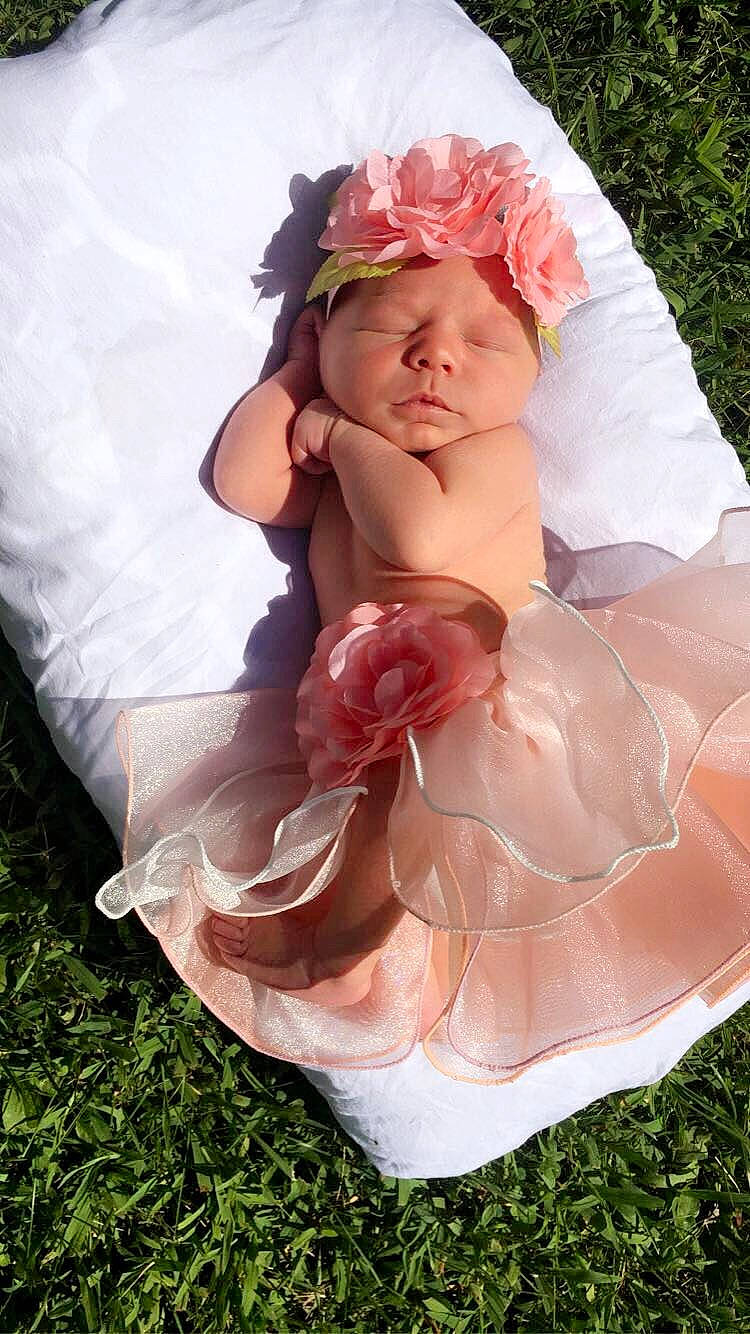 Jayse joined the competition — help win amazing prizes! baby, child, flower, grass, headgear, headpiece, headwear, peach, person, petal, pink, plant, rose, rose_family, textile, toddler