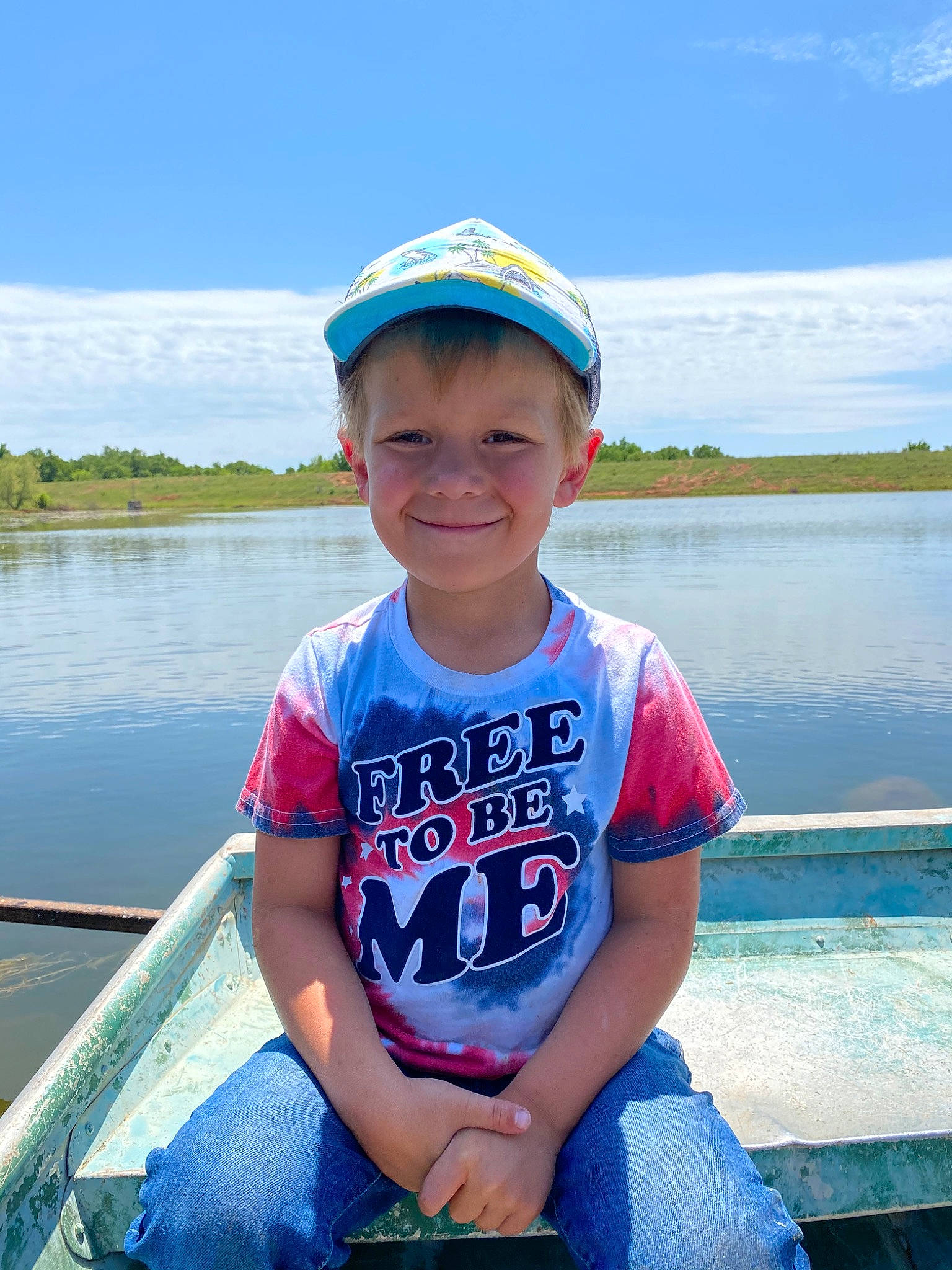 Eastyn joined the competition — help win amazing prizes! boat, boating, child, fun, happy, headwear, joy, lake, leisure, person, plant, recreation, reservoir, river, sitting, smile, summer, tourism, travel, vacation
