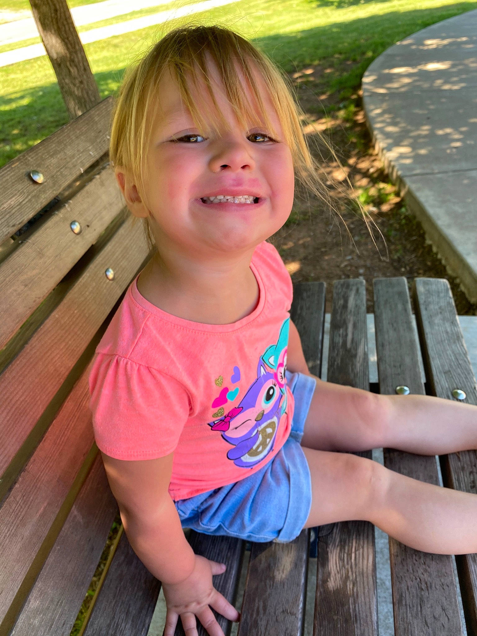 Teagyn is registered to the contest to win money with this photo: blond, child, eye, face, facial_expression, fun, grass, happy, joy, leisure, people, person, photography, pink, play, sitting, skin, smile, summer, toddler