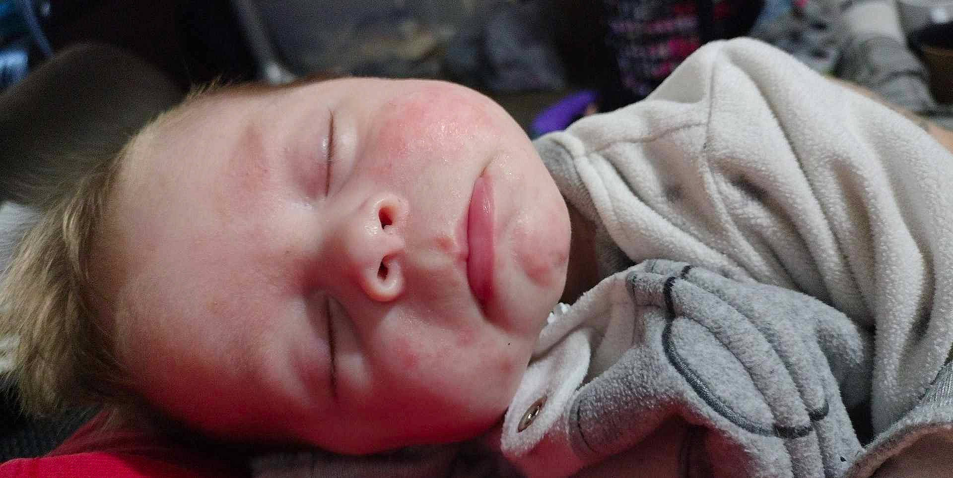 Delia is registered to the contest to win money with this photo: baby, baby_sleeping, baby_toddler_clothing, cheek, child, close_up, comfort, ear, eye, eyebrow, eyelash, finger, hand, happy, human_body, lip, mouth, nose, person, skin