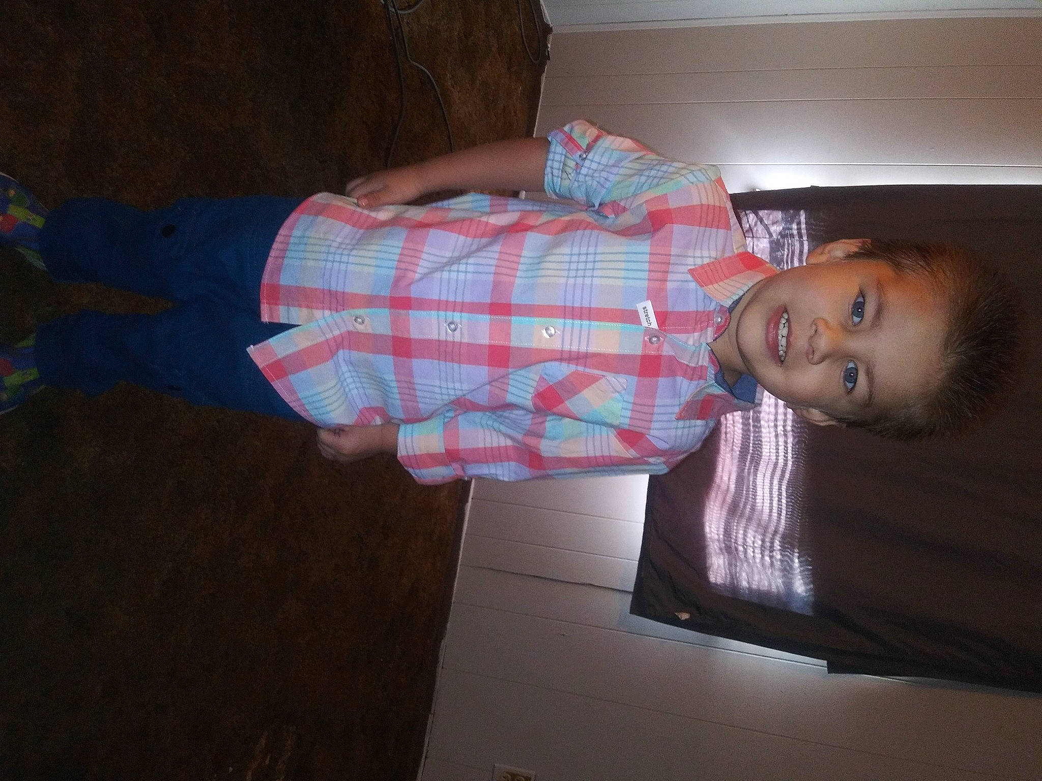 Koby joined the competition — help win amazing prizes! child, comfort, flooring, fun, human_leg, joy, linens, pattern, person, plaid, room, tartan, textile, tints_and_shades, toddler, wood