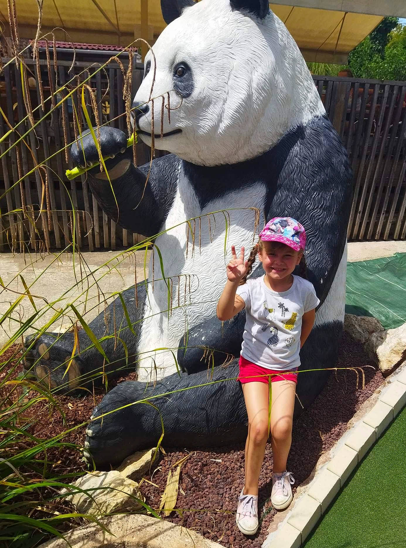 Oxanna participe au concours pour gagner de l'argent avec cette photo : bear, child, fun, fur, garden, grass, happy, headwear, joy, lawn_ornament, leisure, mascot, person, plant, recreation, sculpture, shorts, soil, t_shirt, teddy_bear