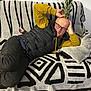 Aziza a rejoint le concours — aidez-le/la à gagner de superbes lots ! man, glasses, pineapple, couch, sphynx_cat, indoor, black_vest, mustard_sweater, bald_head, patterned_blanket, gray_pillow, relaxing, funny_pose, striped_blanket, carpet, home, animal, pet, casual, smiling