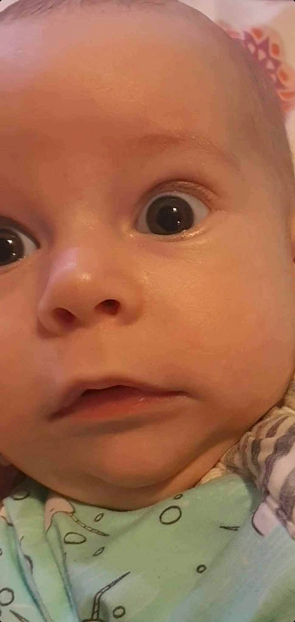 Finley is registered to the contest to win money with this photo: baby, cheek, child, chin, close_up, ear, eye, eyebrow, eyelash, face, forehead, head, iris, lip, mouth, no_expression, nose, person, skin, sleeve