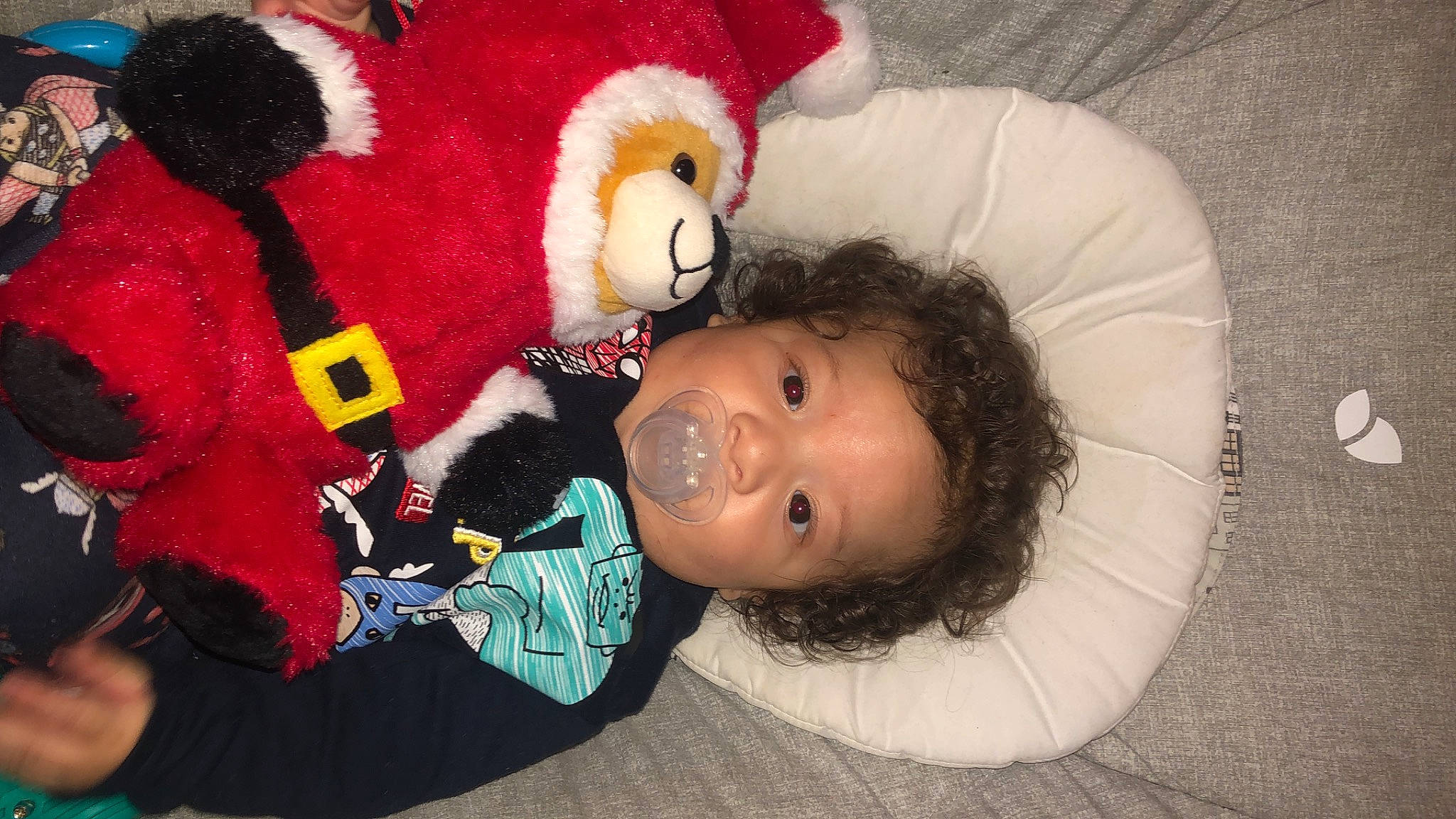 Riley is registered to the contest to win money with this photo: baby_toddler_clothing, baby_toys, beanie, cap, carmine, child, comfort, costume, fictional_character, fun, fur, happy, head, nose, person, plush, stuffed_toy, teddy_bear, textile, toddler