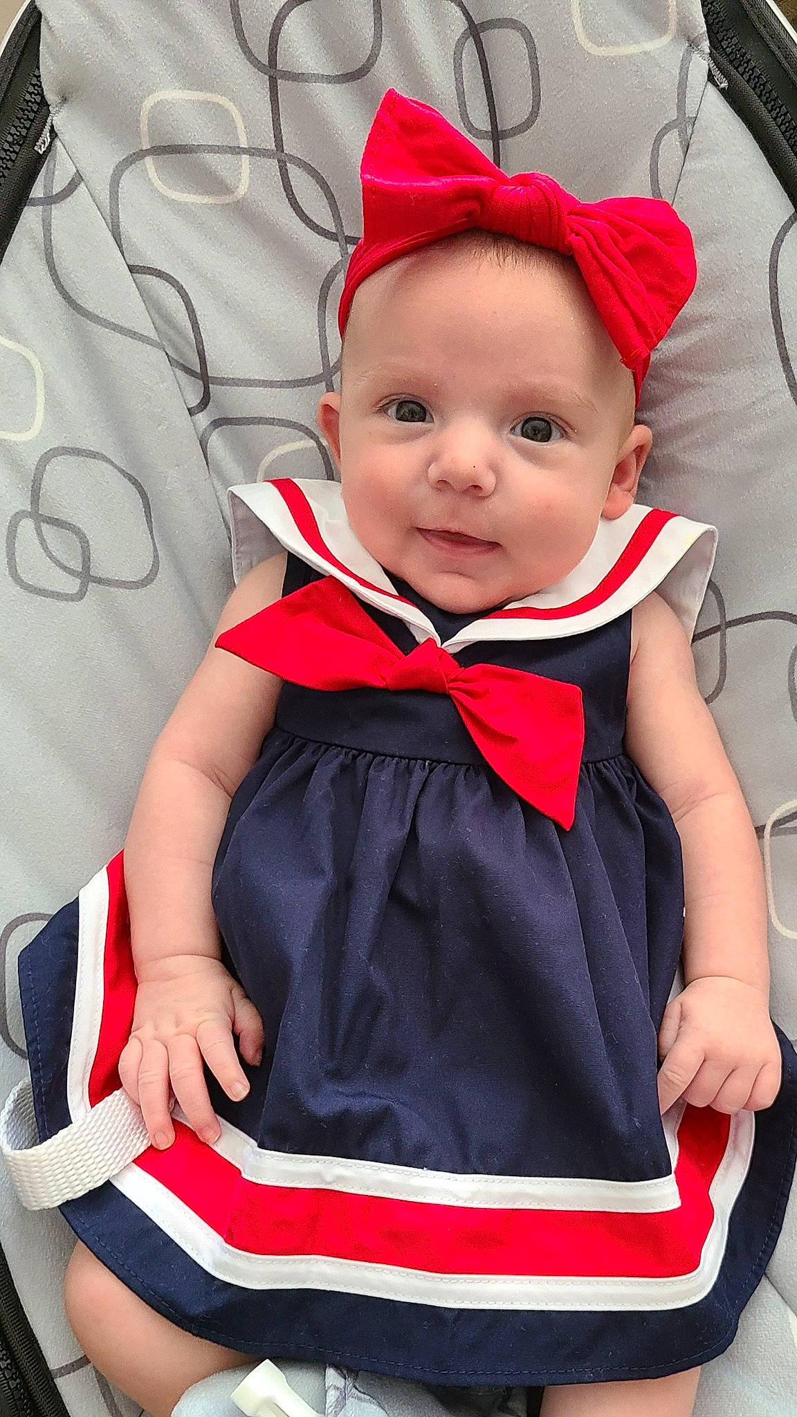 Ryleigh is registered to the contest to win money with this photo: baby, baby_products, baby_toddler_clothing, child, child_model, clothing, costume, dress, headwear, outerwear, person, product, red, toddler, uniform