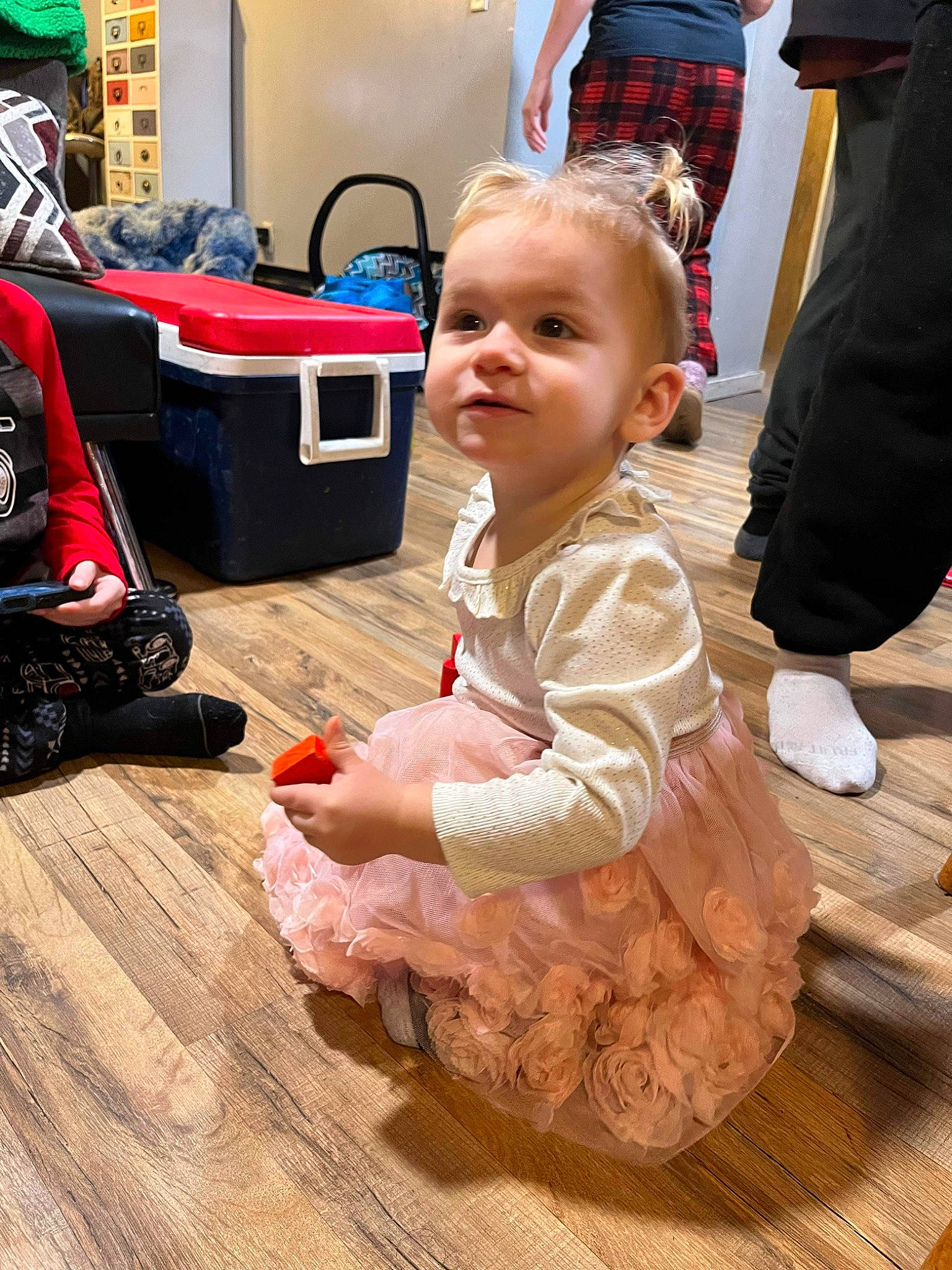 Gracelynn joined the competition — help win amazing prizes! baby, baby_toddler_clothing, backpack, bag, child, event, floor, flooring, fun, hardwood, luggage_and_bags, person, room, shoe, sitting, smile, sneakers, toddler, vacation, wood