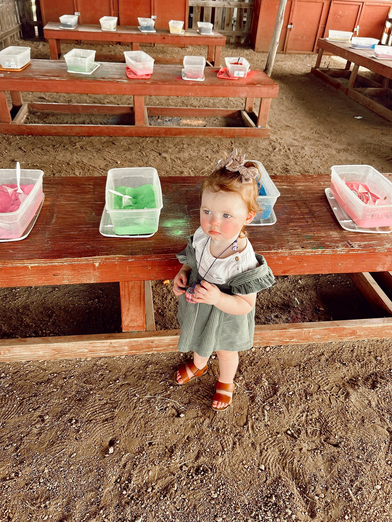 Scarlett joined the competition — help win amazing prizes! baby, baby_toddler_clothing, brick, child, city, flooring, fun, grass, leisure, person, play, room, sitting, soil, toddler, wood